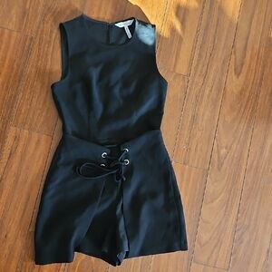 BCBG black Sleeveless Romper with Lace-Up Detail